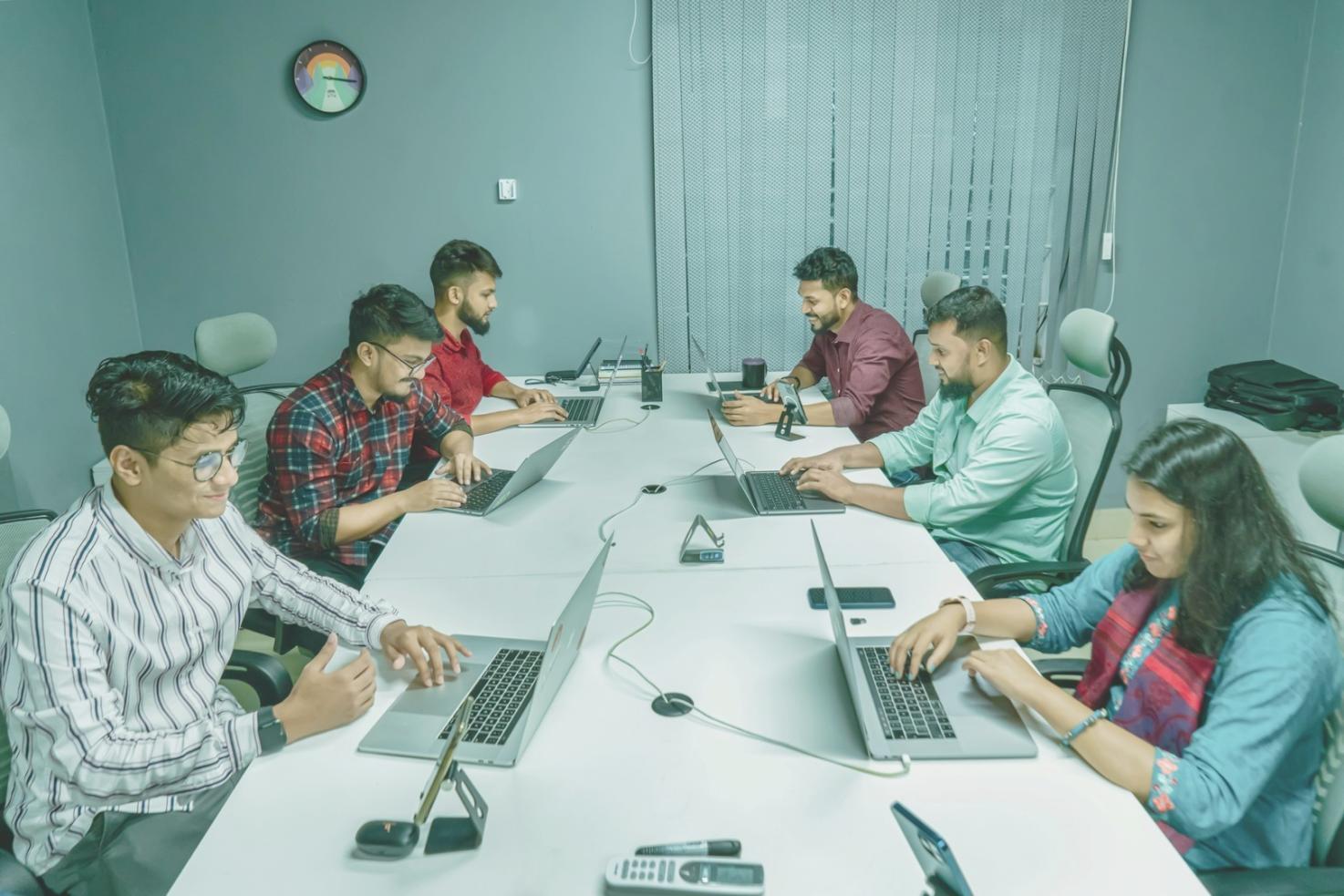Real device performance testing setup with multiple smartphones showing app optimization metrics